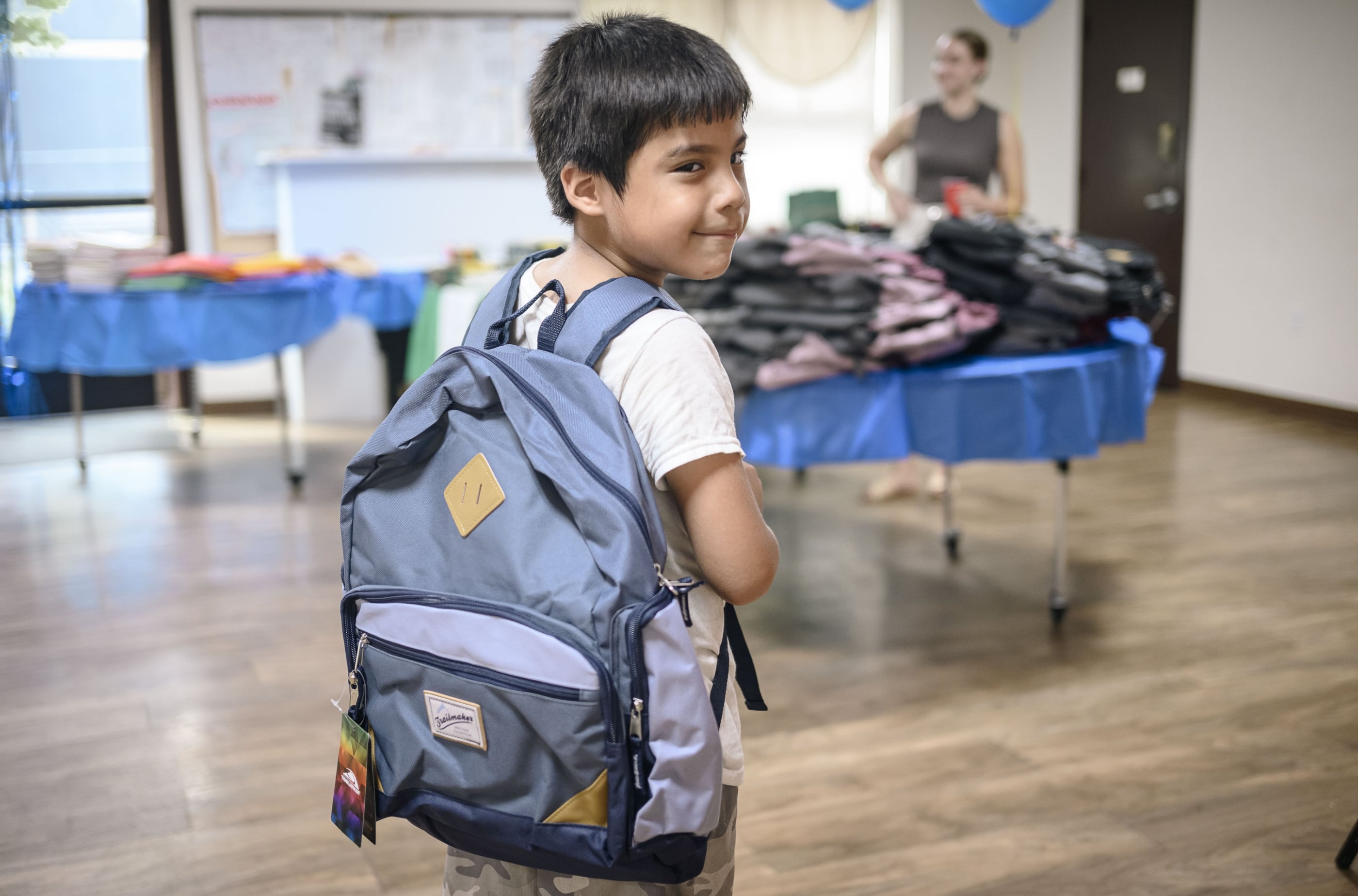 Belveron Donates and Distributes Backpacks and School Supplies in Harlem